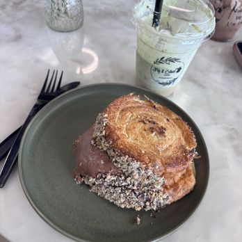 Fig and Olive Cafe - Chocolate Hazelnut New York Roll and Pistachio Cream Iced Coffee - Desserts Near Me - Greensboro, North Carolina Fig and Olive Cafe - Chocolate Hazelnut New York Roll and Pistachio Cream Iced Coffee - Desserts Near Me - Greensboro, North Carolina