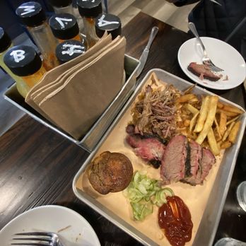 Black Ember Grill - Brisket tray, added pulled pork served with cornbread, pickles, coleslaw & hand cut fries - Barbeque Near Me - West Dover, Vermont Black Ember Grill - Brisket tray, added pulled pork served with cornbread, pickles, coleslaw & hand cut fries - Barbeque Near Me - West Dover, Vermont