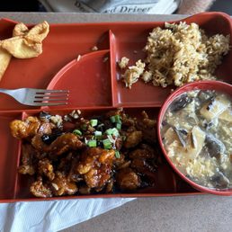 General Tso chicken, sweet, sour soup, and fried rice