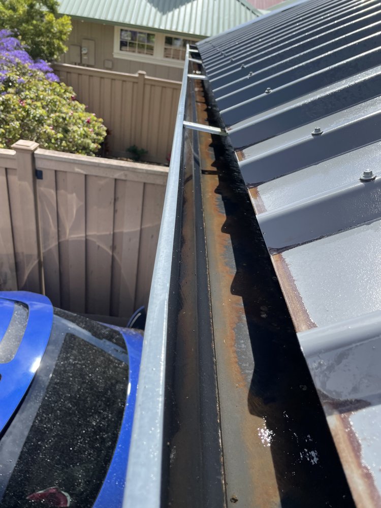 Slide of Ace Roof & Gutter Cleaning
