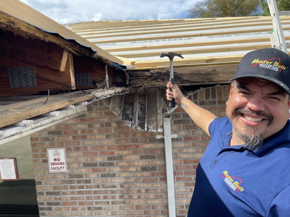 Slide of Master Built Roofing