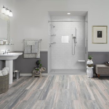 Ocala Baths - a modern bathroom with wood flooring - General Contractors Near Me - Ocala, Florida Ocala Baths - a modern bathroom with wood flooring - General Contractors Near Me - Ocala, Florida