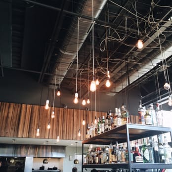 The Promontory - View from the bar - dazzling lightbulb mobiles! - Bars Near Me - Chicago, Illinois