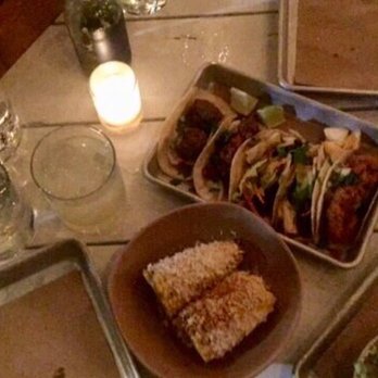 Bartaco - Orlando - Here's a shitty picture of some tacos, corn and margs. The guacamole didn't stand a chance. Gone before the photo - Tacos Near Me - Orlando, Florida