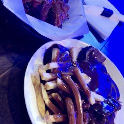 West End Grille - Hot roast beef sandwich and chicken wing basket