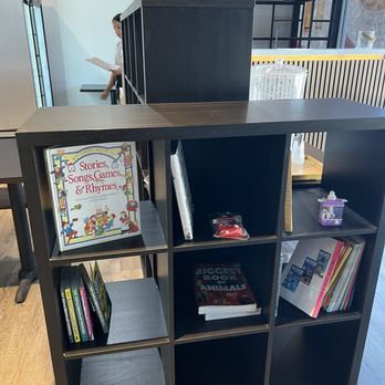 SHwonton - Book shelf with books - Asian Fusion Near Me - Rancho Cucamonga, California SHwonton - Book shelf with books - Asian Fusion Near Me - Rancho Cucamonga, California