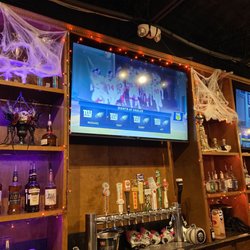 Jack's Tavern - Fun Halloween decor. Tvs above the bar. 1 of the tap area. I think there was 2