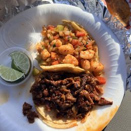 El pastor and shrimp tacos. Very flavorful. El pastor and shrimp tacos. Very flavorful.