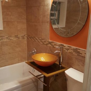 T-N-D Construction - ows a bathroom with a sink, toilet and tub - General Contractors Near Me - Chicago, Illinois T-N-D Construction - ows a bathroom with a sink, toilet and tub - General Contractors Near Me - Chicago, Illinois