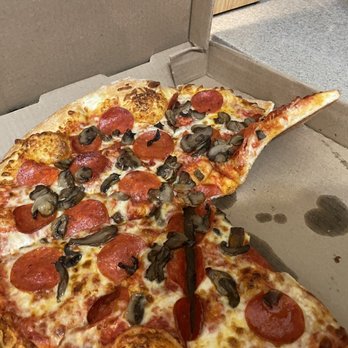 Main Street Pizza - Large mushroom and pepperoni pizza. *Someone* couldn't wait for me to take the picture. - Pizza Near Me - Plymouth, Michigan Main Street Pizza - Large mushroom and pepperoni pizza. *Someone* couldn't wait for me to take the picture. - Pizza Near Me - Plymouth, Michigan