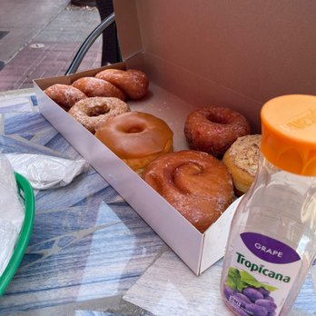 Dandee Donut Factory - Half dozen donuts. The raspberry jelly donut didn't survive. - Donuts Near Me - Pompano Beach, Florida