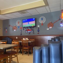 Four Seas Pizza & Restaurant - Plenty of seating and TVs, love the decor