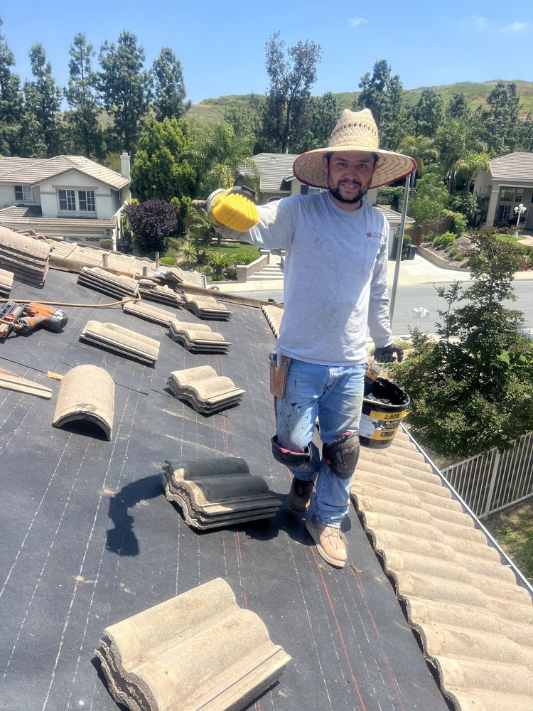 Slide of J P Roofing