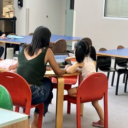 Monterey Park Bruggemeyer Library - Learning on laptop
