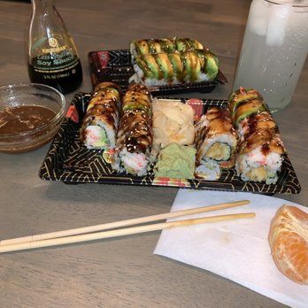 Sushi Garden Bistro - a plate of sushi with chopsticks - Sushi Bars Near Me - American Fork, Utah Sushi Garden Bistro - a plate of sushi with chopsticks - Sushi Bars Near Me - American Fork, Utah