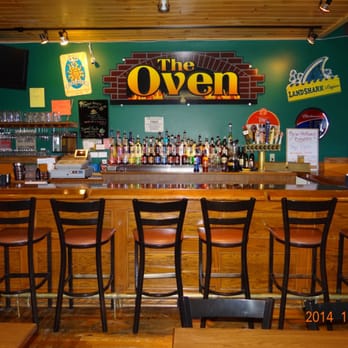The Oven - a bar with wooden bar stools - Pizza Near Me - Caro, Michigan The Oven - a bar with wooden bar stools - Pizza Near Me - Caro, Michigan