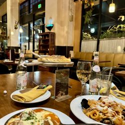 Four cheese Spaghetti with meatballs, Meat Lover Calzone, seafood pasta.