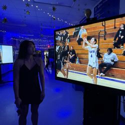 Stanton College Preparatory School - My daughter looking at her own picture (taken inside SCP gym during a basketball game vs ACHS) in the slideshow during Senior Awards night