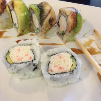 Hanabi Sushi - Dragon roll on top, CA roll on bottom. I wish the CA roll had more avocado than the tiny sliver they gave me :( - Japanese Near Me - Concord, California