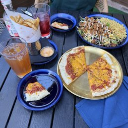 Fried chicken pasta salad, margarita pizza, and French fries. Fried chicken pasta salad, margarita pizza, and French fries.