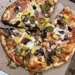 Burnt pizza with looks like a missing piece Burnt pizza with looks like a missing piece