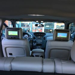 Chavez Electronics - Head rest monitors w/dvd installation.