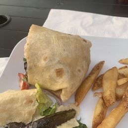 Deli-turkey, grape tomatoes cut in half, lettuce, mayo, stale wrap, about 12 fries. Deli-turkey, grape tomatoes cut in half, lettuce, mayo, stale wrap, about 12 fries.