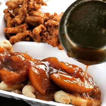 Vegan Or Nah - Alkaline chickun (oyster mushrooms, battered in seasoned garbanzo bean flour) and Alkaline spelt waffles with Peach Cobbler topping. - Vegan Near Me
