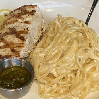 Del Sur Artisan Eats - Mahi Mahi with a side of linguini in Alfredo sauce (so good next day and ordered Caesar salad and a side of the linguini with Alfredo) - Steakhouses Near Me - Saint Simons Island, Georgia