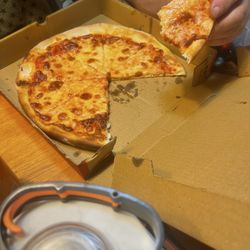Raffaele's - Medium pepperoni pizza extra cheese , the bread was well overdone.