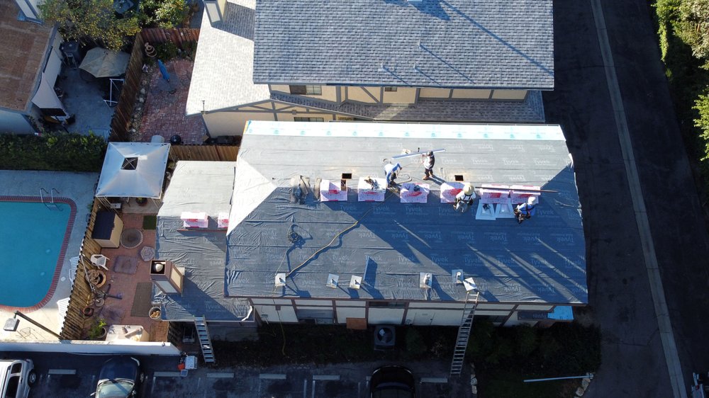 Slide of Mega Roofing