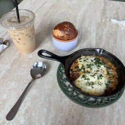 Shakshuka with challah and a fig leaf latte Shakshuka with challah and a fig leaf latte