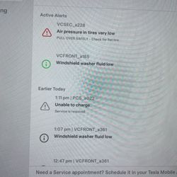 Hertz Rent A Car - These are the alerts for the low air in the tire, and no windshield liquid was empty