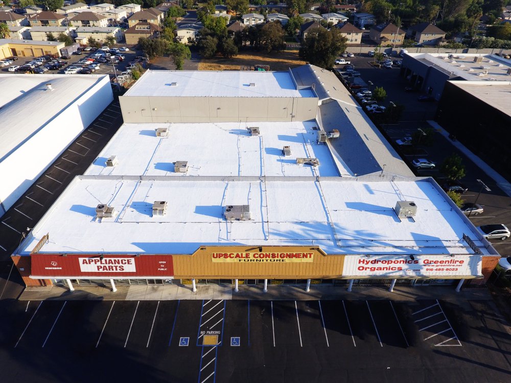 Slide of Flat Roof Pros