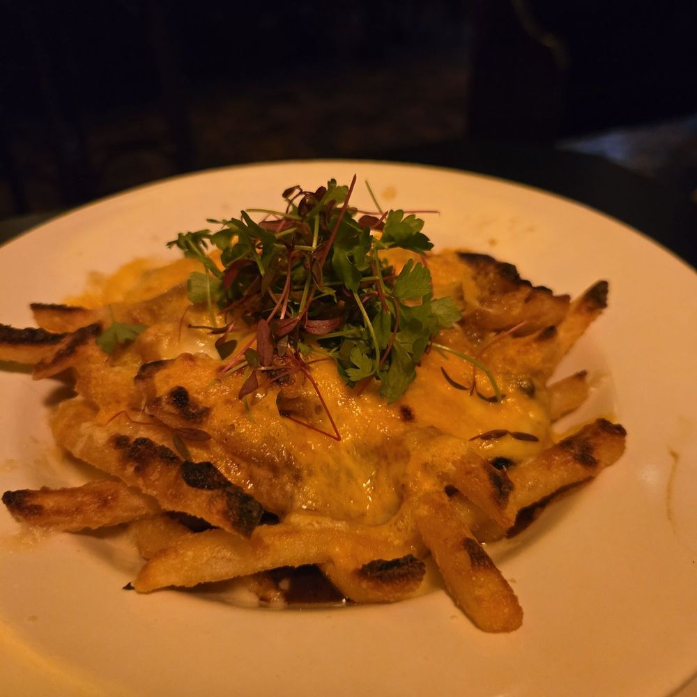 The Wolves - Poutine with fries extra crispy - Cocktail Bars Near Me - Los Angeles, California The Wolves - Poutine with fries extra crispy - Cocktail Bars Near Me - Los Angeles, California