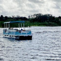 Florida Boat Tours - Jiggs Landing Outpost - Our 30ft. Ferry that takes you along the river to Linger Lodge.