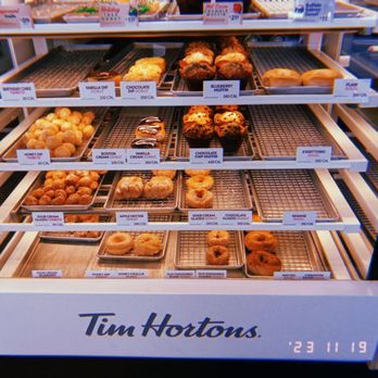 Tim Hortons - a display case of donuts - Coffee & Tea Near Me - Niagara Falls, New York Tim Hortons - a display case of donuts - Coffee & Tea Near Me - Niagara Falls, New York