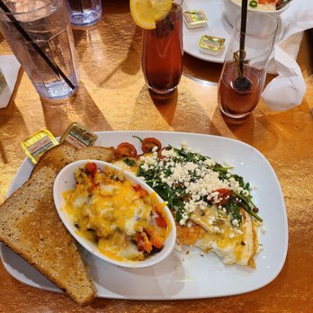 Another Broken Egg Cafe - Veggie omelet with salmon added with grain toast and potatoes with cheese onions, peppers, and mushrooms. - Breakfast & Brunch Near Me - Miamisburg, Ohio Another Broken Egg Cafe - Veggie omelet with salmon added with grain toast and potatoes with cheese onions, peppers, and mushrooms. - Breakfast & Brunch Near Me - Miamisburg, Ohio