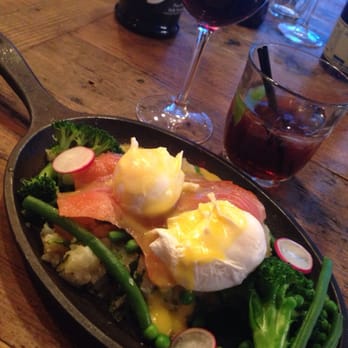 Artisan - Main - Skillet of smoked salmon, poached eggs, green veg, hollandaise and crushed potatoes. - British Near Me - Manchester, XGM