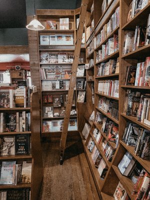 Between the Covers Bookstore and Bruno Cafe by null