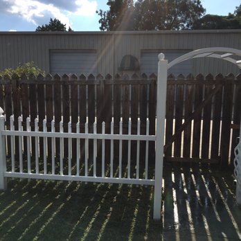 Marlon's Landscaping - a white picketer and gate - Landscaping Near Me - Wilson, North Carolina
