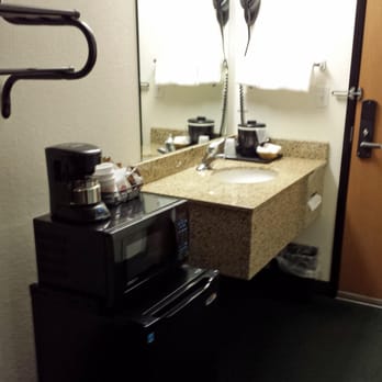 Oak Tree Inn - Mini-fridge, microwave, coffee maker, hair dryer and sink area - Hotels Near Me - North Platte, Nebraska Oak Tree Inn - Mini-fridge, microwave, coffee maker, hair dryer and sink area - Hotels Near Me - North Platte, Nebraska