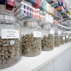 We keep our flower fresh in large glass jars for you to see and smell before selecting a strain at our dispensary in Denver.