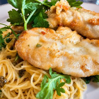 CōV Wayzata - Chicken Piccata  Tender chicken over angel hair in a bright lemon-butter caper sauce. - Cocktail Bars Near Me - Wayzata, Minnesota