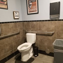 Sunset Alehouse - Ladies room is large. Diaper station across from toilet. Clean.