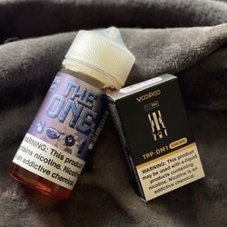 Spacecraft Vapor - The One in Blueberry and a three pack of coils.