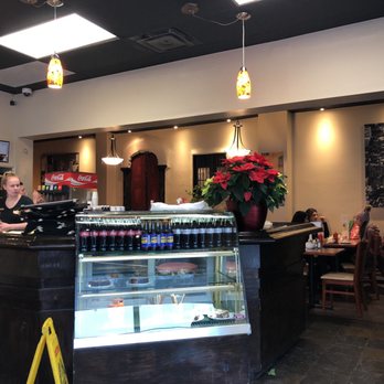 West End Diner - a woman behind the counter - Diners Near Me - Hamilton, Ontario