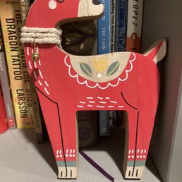One of my many Occasionette purchases - an adorable wooden reindeer (so cute that I decided to keep him on my bookshelf year round).