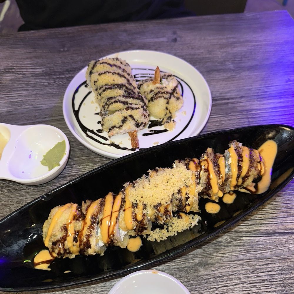 Philly golden roll (black plate)  Crunch roll (white plate)