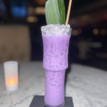 The Copper Lounge - a purple drink in a tall glass - Lounges Near Me - Albuquerque, New Mexico